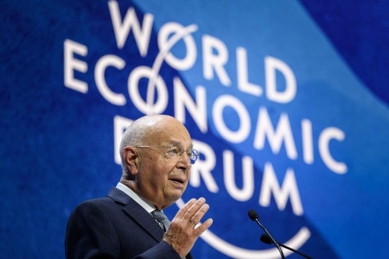(FILES) Founder and executive chairman of the World Economic Forum Klaus Schwab addresses the assembly during the World Economic Forum (WEF) annual meeting in Davos, on May 24, 2022. The Alpine resort of Davos will host the 54th annual meeting of the World Economic Forum from 15th to 19th January 2024. (Photo by FABRICE COFFRINI / AFP)