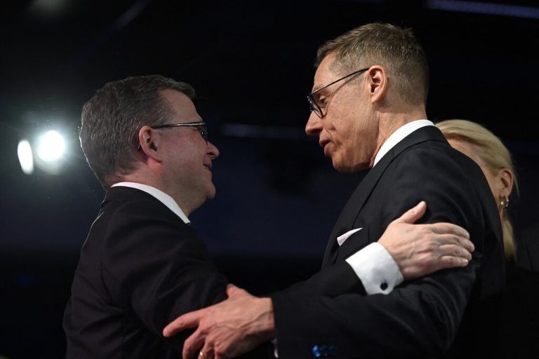 Finland's Prime Minister Petteri Orpo and National Coalition Party (NCP) presidential candidate Alexander Stubb (R) react at Stubb's election reception in Helsinki, Finland, on February 11, 2024. Finland's former prime minister Alexander Stubb and ex-foreign minister Pekka Haavisto face off on February 11 in the second and decisive round of the country's presidential election. (Photo by Emmi Korhonen / Lehtikuva / AFP) / Finland OUT
