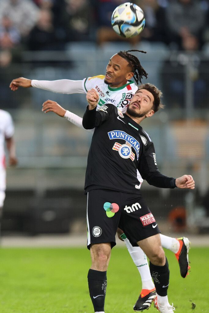 GRAZ,AUSTRIA,03.MAR.24 - SOCCER - ADMIRAL Bundesliga, SK Sturm Graz vs Wolfsberger AC. Image shows Thierno Ballo (WAC) and Otar Kiteishvili (Sturm).<br />Photo: GEPA pictures/ Chris Bauer