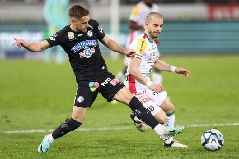 GRAZ,AUSTRIA,03.MAR.24 - SOCCER - ADMIRAL Bundesliga, SK Sturm Graz vs Wolfsberger AC. Image shows Tomi Horvat (Sturm) and Sandro Altunashvili (WAC).<br />Photo: GEPA pictures/ Chris Bauer