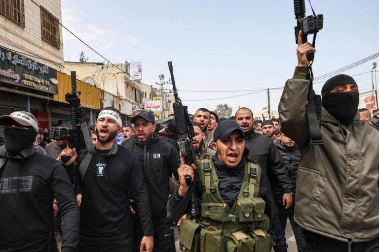 Palestinian gunmen attend a funeral of men who were killed during an Israeli army raid on Jenin in the occupied West Bank, on March 27, 2024. The West Bank has seen a surge in violence, to levels unseen in nearly two decades, since the Israel-Hamas war in Gaza began on October 7. (Photo by Zain JAAFAR / AFP)