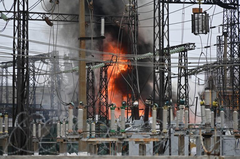 This photograph taken on March 22, 2024, shows a fire at an electrical substation after a  missile attack in Kharkiv, amid the Russian invasion in Ukraine. (Photo by SERGEY BOBOK / AFP)