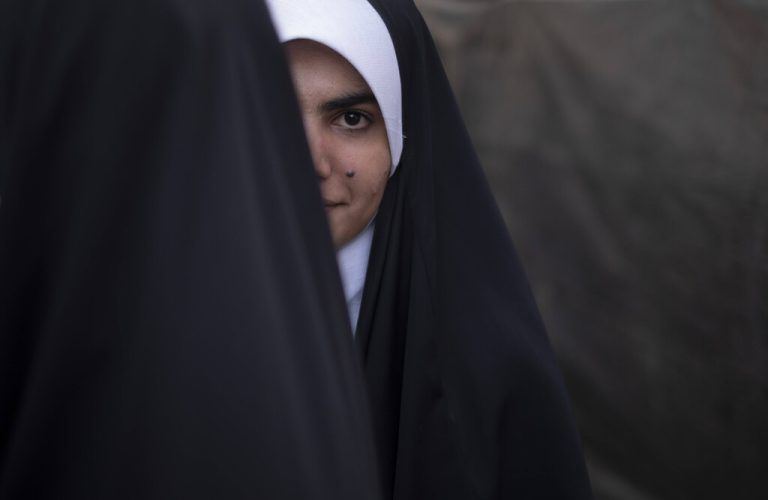 Iran-First Day Of The Week Of Hijab And Chastity A veiled Iranian woman looks on while taking part a rally in support of Hijab, and against women who do not wear the mandatory Hijab, in southern Tehran, July 12, 2023. Iranian protesters gathered at Imam Hossein Square to show their anger towards women who do not wear the mandatory Hijab on the first day of Hijab and Chastity. Tehran Tehran Iran PUBLICATIONxNOTxINxFRA Copyright: xMortezaxNikoubazlx originalFilename: nikoubazl-iranfirs230712_npXr6.jpg