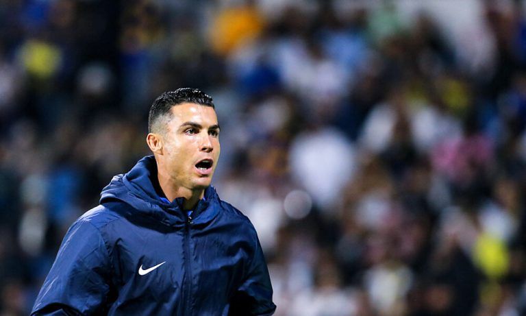 Nassr's Portuguese forward #07 Cristiano Ronaldo reacts while warming up during the Saudi Pro League football match between Damac FC and Al-Nassr FC at Prince Sultan bin Abdulaziz Sports City stadium in Abha on April 5, 2024. (Photo by Mohammed ALSHEHRI / AFP)