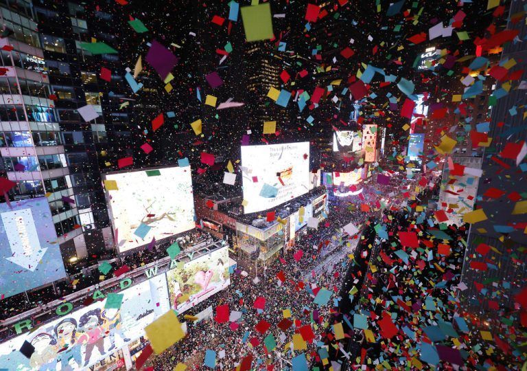 Revelers throw confetti when the giant seven-foot-tall numerals for 2024 light up and the Times Square Ball drops at midnight in Times Square for the New Year s Eve celebrations in New York City on Monday, January 1, 2024. PUBLICATIONxINxGERxSUIxAUTxHUNxONLY NYP20240101201 JohnxAngelillo
