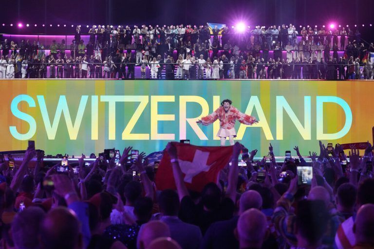 Nemo of Switzerland, who performed the song The Code, celebrates after winning the Grand Final of the Eurovision Song Contest in Malmo, Sweden, Sunday, May 12, 2024. (AP Photo/Martin Meissner)