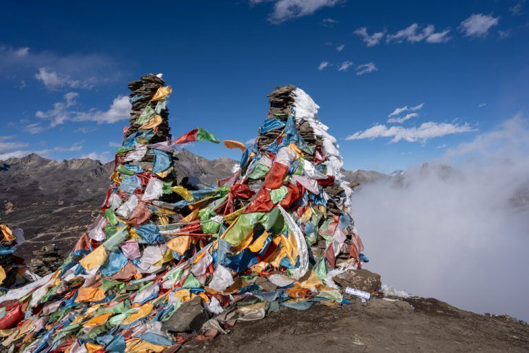 A shot of some trash on top of mount Everest under blue sky Model Released Property Released xkwx mountains, blue, sky, view, travel, nature, top, everest, high, mount, snow, background, landscape, environment, natural, trekking, peak, nobody, nepal, lhotse, altitude, rock, peaks