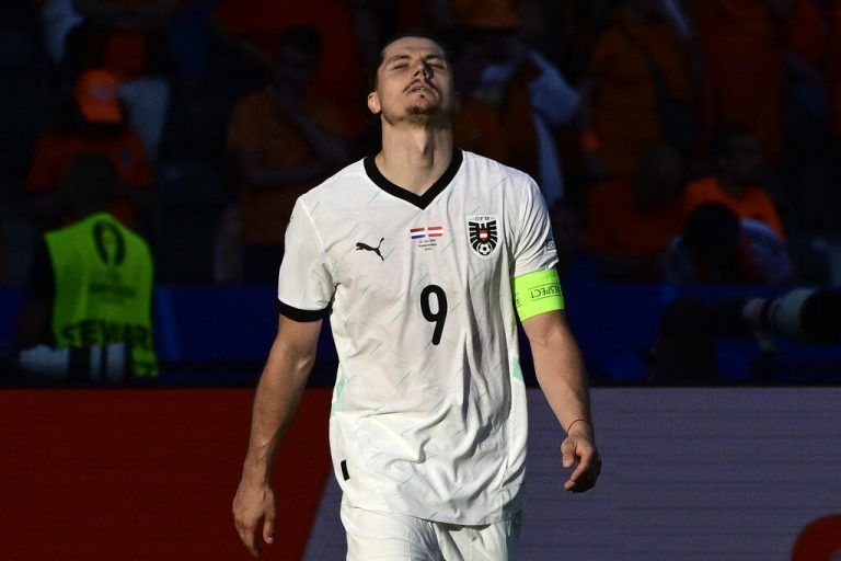 Austria's midfielder #09 Marcel Sabitzer celebrates scoring his team's third goal during the UEFA Euro 2024 Group D football match between the Netherlands and Austria at the Olympiastadion in Berlin on June 25, 2024. (Photo by JOHN MACDOUGALL / AFP)