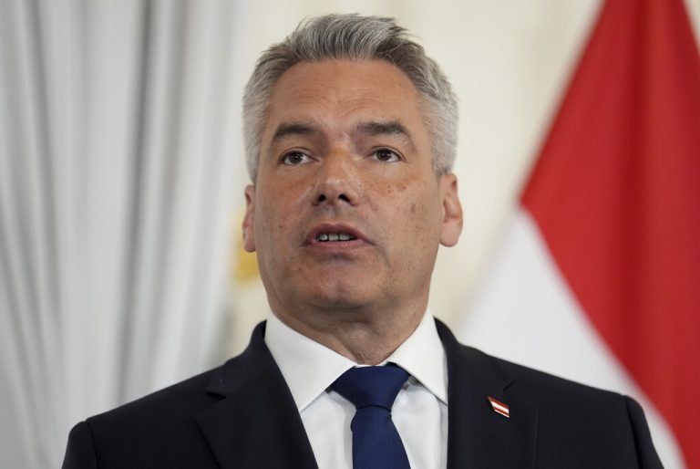 FILE - The Chancellor of Austria, Karl Nehammer speaks at a joint press conference with Prime Minister Rishi Sunak, at Federal Chancellery Ballhausplatz in Vienna, during a visit to Austria, Tuesday May 21, 2024. Nehammer said Monday, June 17, 2024, that his conservative Austrian People's Party would continue the current government coalition with its Green party junior partner even though his environment minister voted in a European Union vote in favor of the the so-called Nature Restoration plan that Nehammer's has opposed. (Jordan Pettitt/pool photo via AP, File)