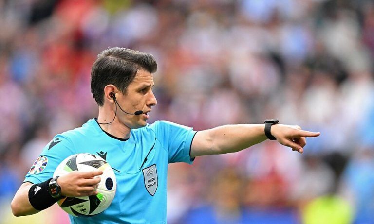 Turkish referee Umut Meler gestures during the UEFA Euro 2024 Group E football match between Belgium and Slovakia at the Frankfurt Arena in Frankfurt am Main on June 17, 2024. (Photo by Kirill KUDRYAVTSEV / AFP)