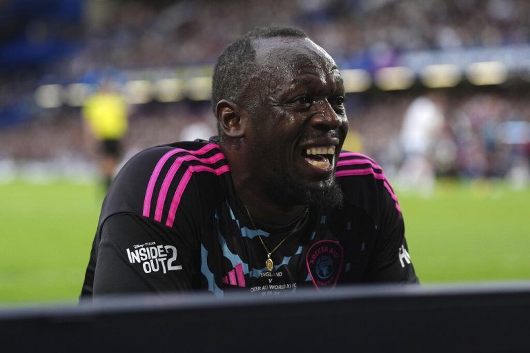 World XI's Usain Bolt rues a missed chance during Soccer Aid for UNICEF 2024 at Stamford Bridge, London, Sunday June 9, 2024. (Bradley Collyer/PA via AP)