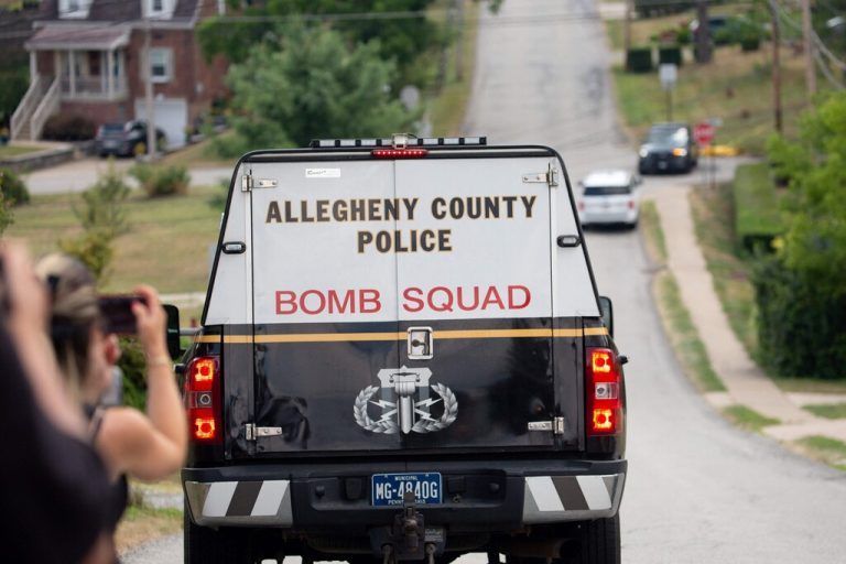 An Allegheny County Police Bomb Squad car drives towards the home of Thomas Matthew Crooks, the suspected shooter of former US President Donald Trump, as the FBI carries out an investigation, in Bethel Park, Pennsylvania, on July 14, 2024. Donald Trump said that it was divine intervention that helped him survive an assassination attempt during a campaign rally in Pennsylvania, and called on Americans to unite. (Photo by Rebecca DROKE / AFP)