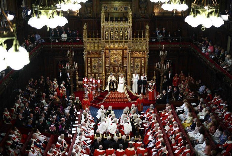 Britain's King Charles III, wearing the Imperial State Crown and the Robe of State, reads the King's Speech from the The Sovereign's Throne in the House of Lords chamber, during the State Opening of Parliament, at the Houses of Parliament, in London, on July 17, 2024. (Photo by HENRY NICHOLLS / POOL / AFP)
