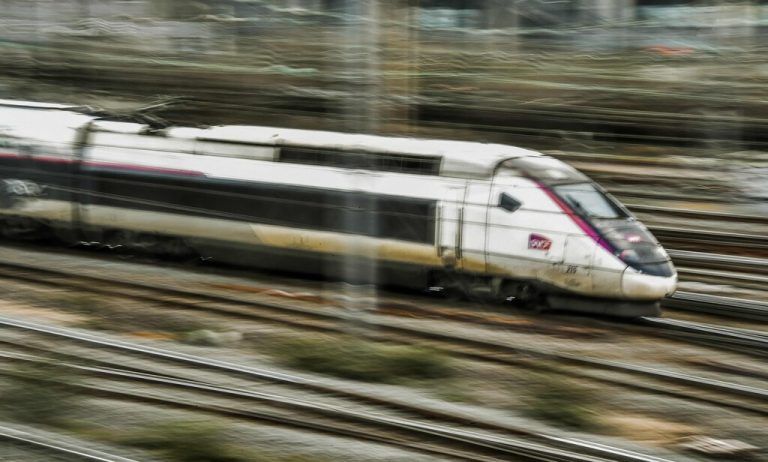 (FILES) This photo taken on March 29, 2018 shows a TGV (train a grande vitesse) at Lille train station. French railway company SNCF suffered a massive attack of sufficient magnitude to paralyze its TGV network on the night of July 25, 2024 to July 26, the group told AFP and TGV traffic on the Atlantic, North and East routes will be very disrupted, a few hours before the opening ceremony of the Olympic Games. (Photo by PHILIPPE HUGUEN / AFP)
