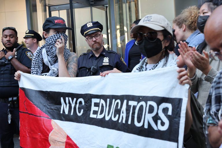 US-CLIMATE-AND-PALESTINE-ACTIVISTS-PROTEST-OUTSIDE-CITIBANK-HEAD