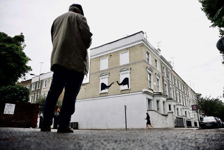 A photograph taken on August 6, 2024, shows a Banksy artwork, depicting elephants, painted on the side of a building in west London. The Artist confirmed the work to be theirs after posting an image of it on the social media app Instagram. (Photo by BENJAMIN CREMEL / AFP) / RESTRICTED TO EDITORIAL USE - MANDATORY MENTION OF THE ARTIST UPON PUBLICATION - TO ILLUSTRATE THE EVENT AS SPECIFIED IN THE CAPTION