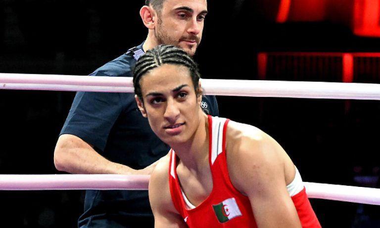 Algeria's Imane Khelif leaves after her women's 66kg preliminaries round of 16 boxing match against Italy's Angela Carini during the Paris 2024 Olympic Games at the North Paris Arena, in Villepinte on August 1, 2024. (Photo by MOHD RASFAN / AFP)