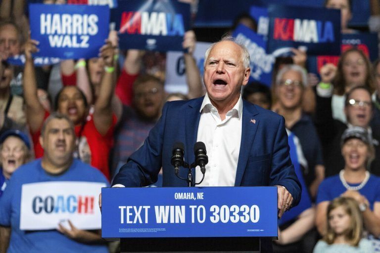 Democratic vice presidential nominee Minnesota Gov. Tim Walz speaks at a campaign rally, Saturday, Aug. 17, 2024, at The Astro in La Vista, Neb. (AP Photo/Bonnie Ryan)