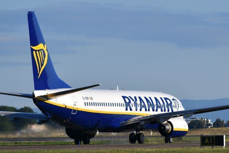 (FILES) In this file photo a Boeing 737 bearing the livery of Irish low-cost airline Ryanair taxies on the tarmac on its way to take off from Rome's Fiumicino airport on May 31, 2019. - Boeing shares surged on December 3, 2020 after Ryanair confirmed a major order of Boeing 737 MAX jets while global stocks treaded water on mixed economic data. The deal for 75 planes by the Irish low-cost carrier was the first major order for the 737 MAX since the aircraft was grounded for 20 months following two fatal crashes. (Photo by Alberto PIZZOLI / AFP)