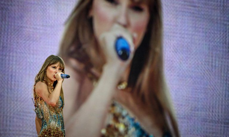 (FILES) US singer and songwriter Taylor Swift performs on stage at the Groupama Stadium as part of The Eras Tour, in Decines-Charpieu, eastern France, on June 2, 2024. Three shows in Vienna by the American mega-star have been cancelled after Austria arrested a man in connection with an Islamist attack plot, the organisers said on August 8, 2024. (Photo by JEFF PACHOUD / AFP) / -- IMAGE RESTRICTED TO EDITORIAL USE - STRICTLY NO COMMERCIAL USE --